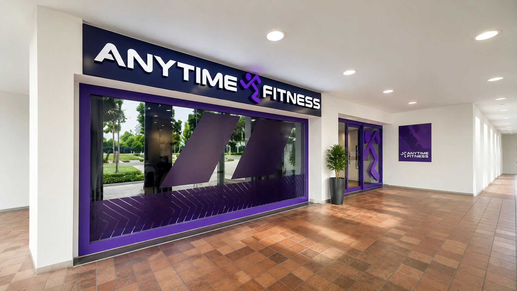 Anytime Fitness Singapore 24-hour gym with professionals training during late evening