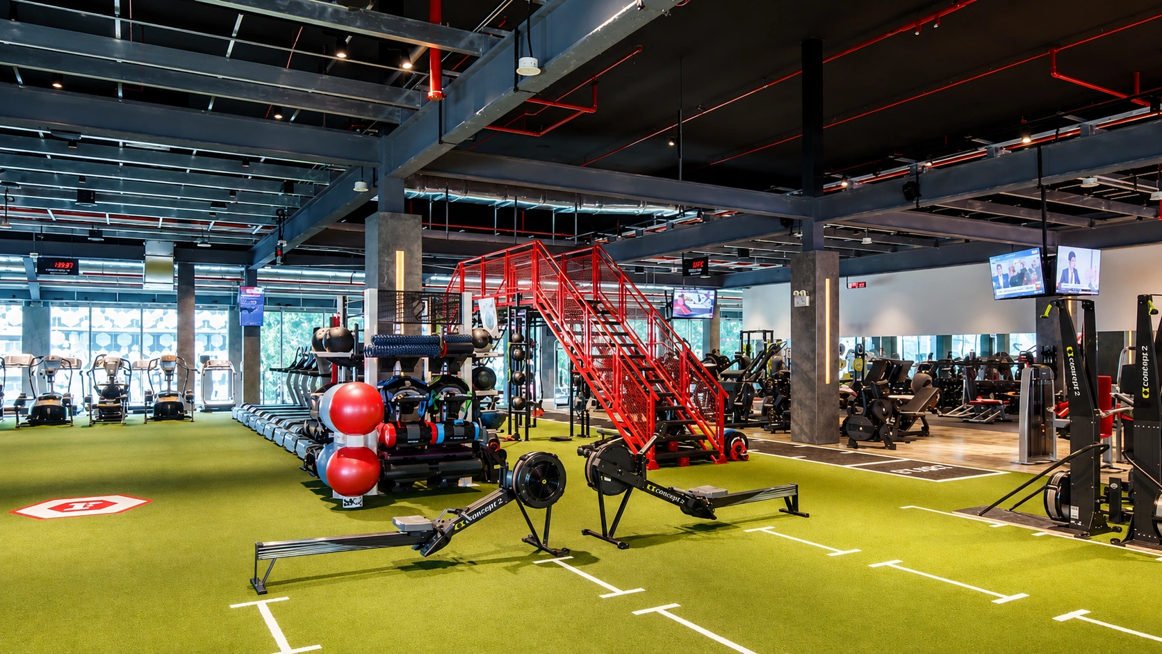 Fitness First Singapore CBD gym with professionals attending a group fitness class